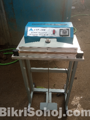Packet sealing machine